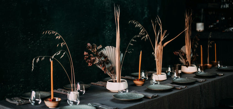Home decor featuring a table designed to elegantly hold candle dust wax and add style
