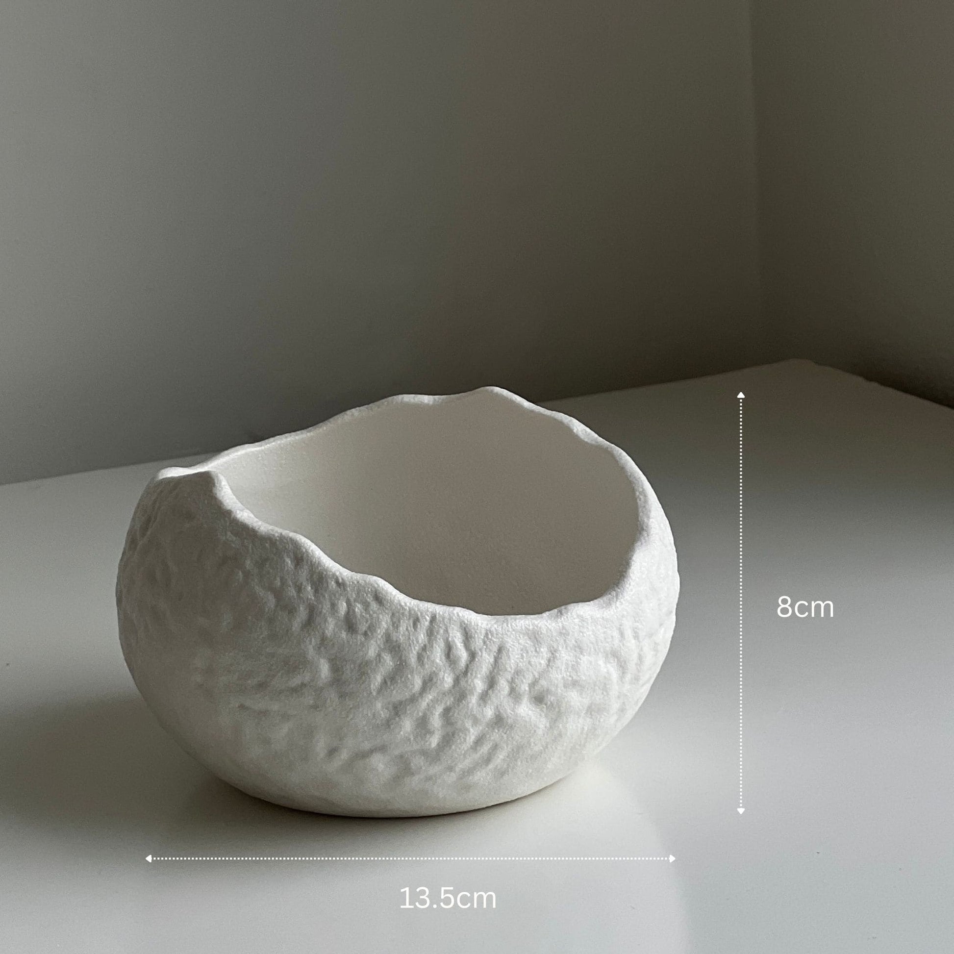 textured ceramic surface of FLAMMÉ Lumi Bowl candle vessel